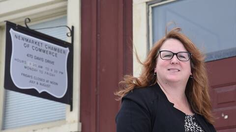 Tracy Walters of the Newmarket chamber of commerce stands in front of her office