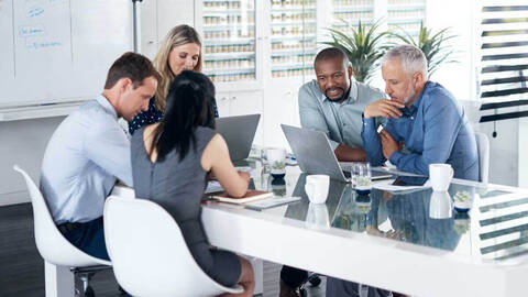 People working at table