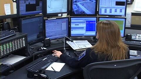 911 Operator Watching Screens