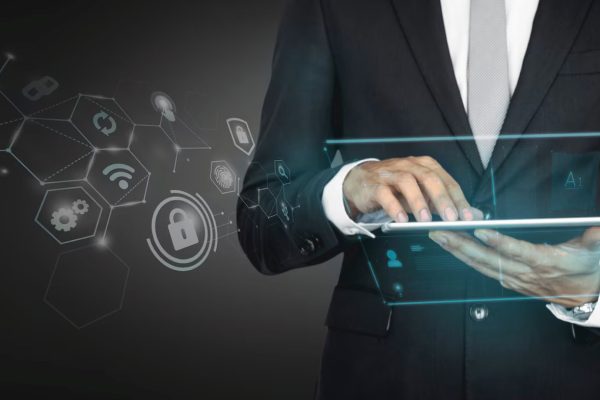 Business man protecting data personal information on tablet,Padlock icon and internet technology networking connection on digital dark blue background