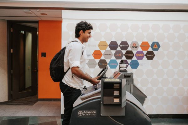 Man riding a floor cleaning machine