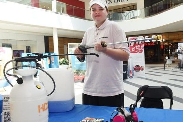 Golden Stickwood at Upper Canada Mall in Newmarket promoting his Summer Company Pressure Washing business.