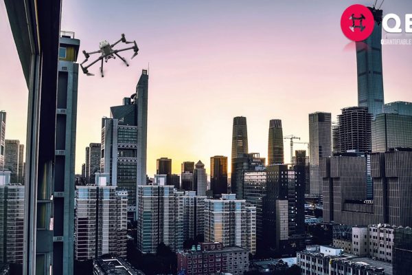 QEA Tech logo and cityscape