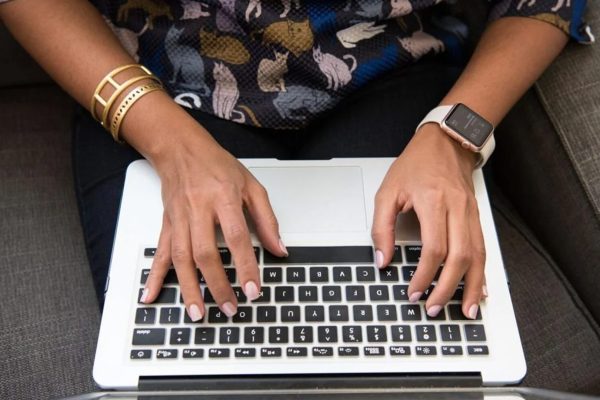 Host in Vaughan / woman on laptop