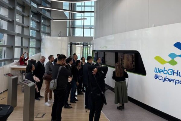 People looking at a web3hub cyberport