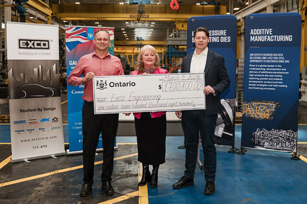 People posing with oversized cheque