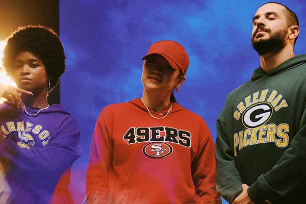 People in NFL gear